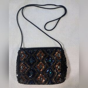 Elegant Black and Gold Crossbody Bag